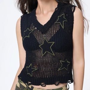 Black mesh cropped sweater vest with super cute green & black stars!